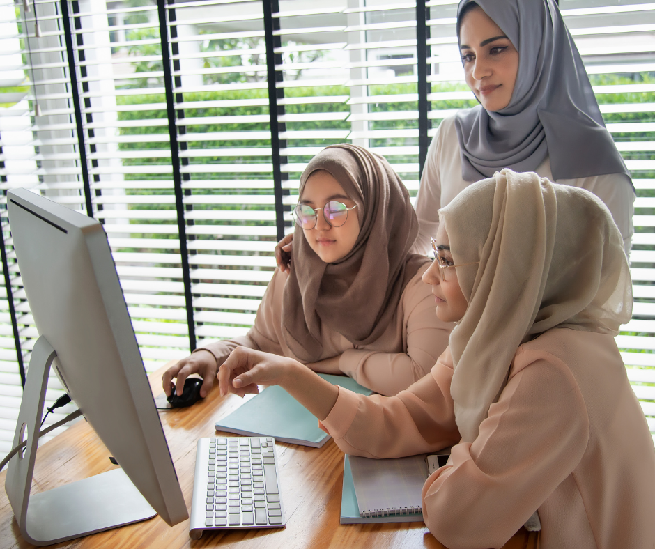 Women studying at a computer