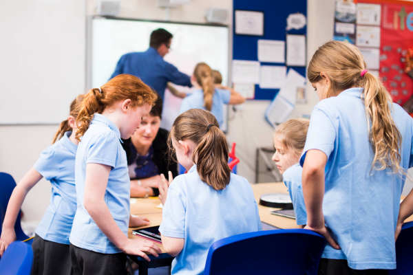 Teaching Assistant with a small group of learners