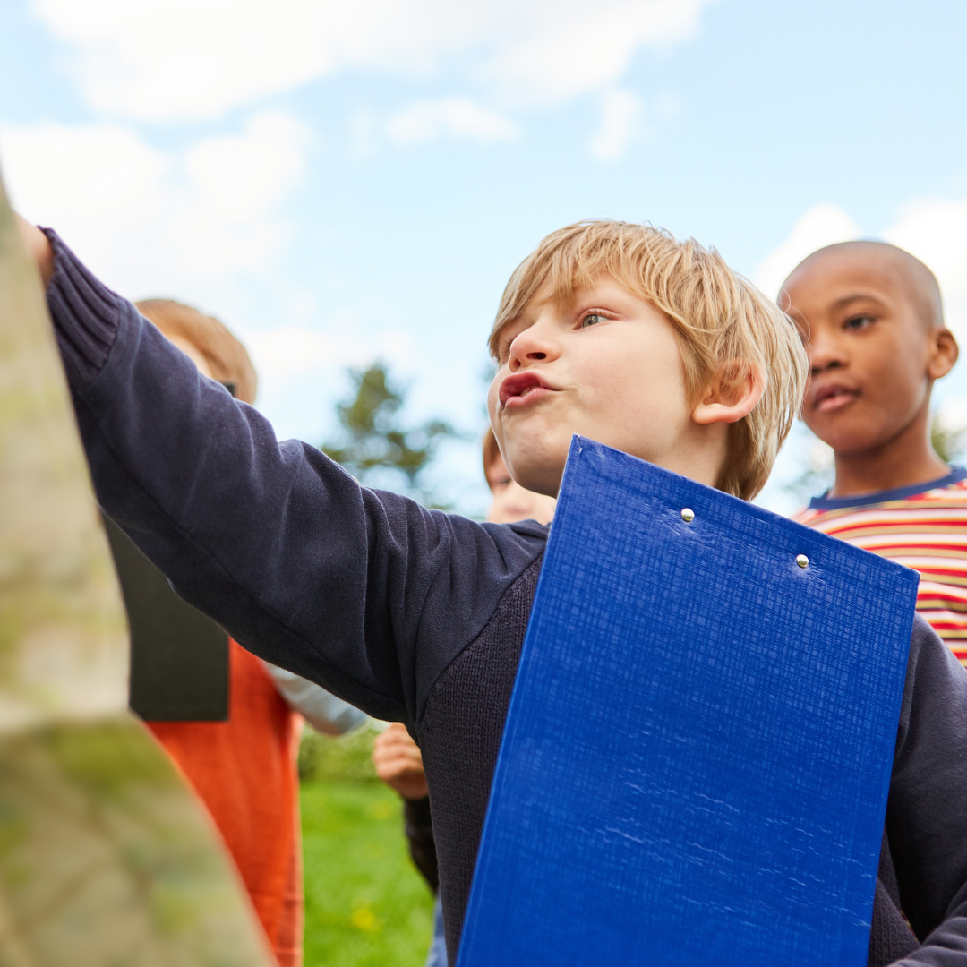 children on a nature scavenger hunt 