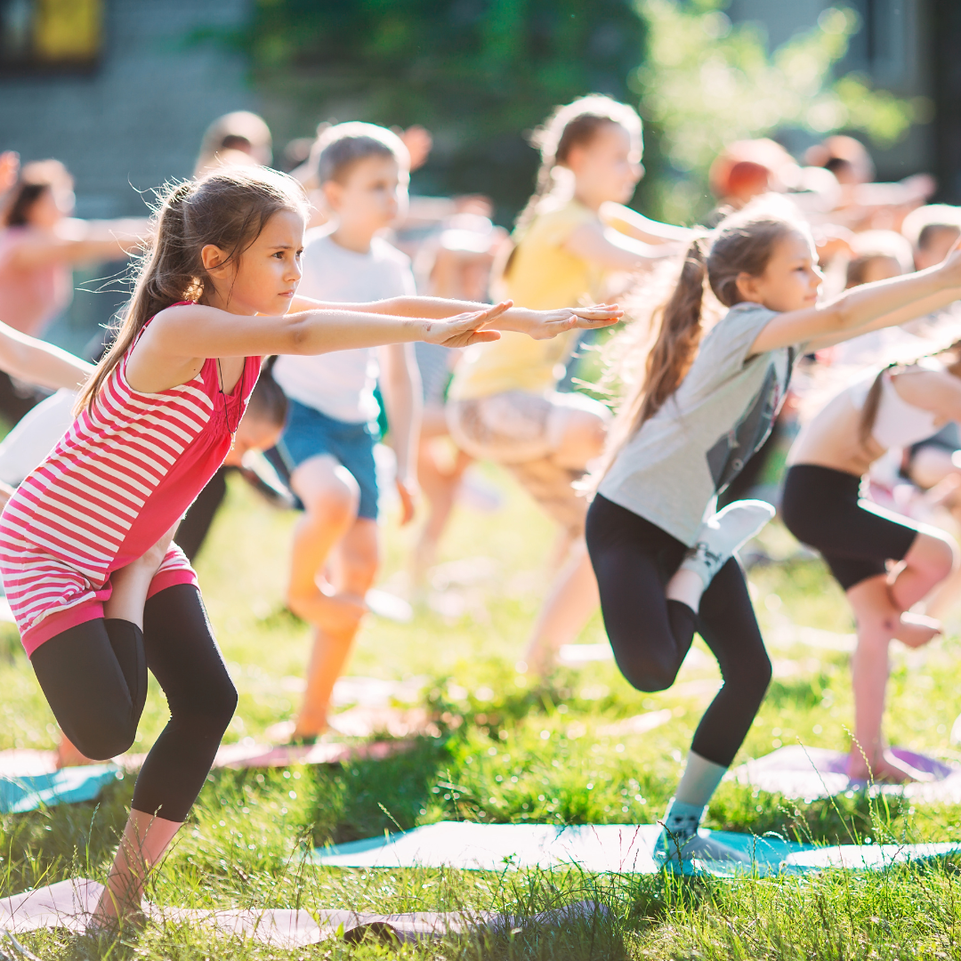 children yoga class outdoors